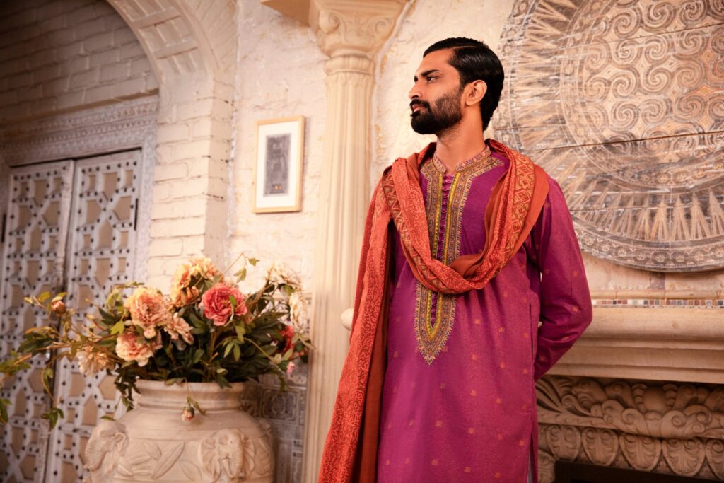 Purple Kurta for Men - Mens kurta - Buy Mens kurta online - Man wearing purple Kurta with red shawl and white trouser - Shadmani wedding Collection