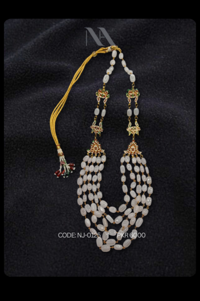 long pearl necklace is a symphony of love and elegance