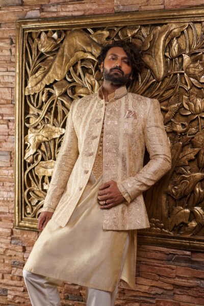 A regal prince coat infused with radiant embroidery, designed for grooms and grand celebrations. Tradition and elegance woven into one royal masterpiece.