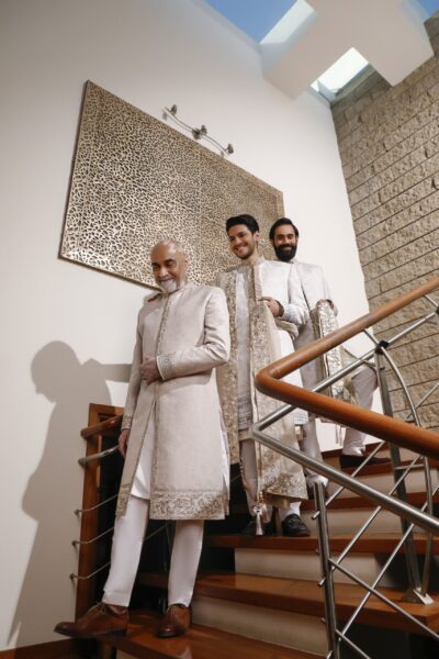 refined white sherwani with elegant embroidery