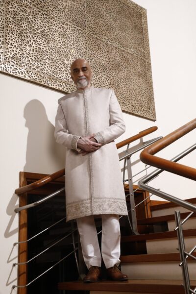 refined white sherwani with elegant embroidery