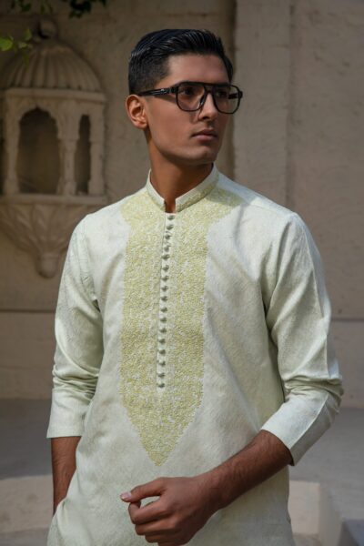 Buy THE LIME LUMINARY, a unique mint-lime shimmer kurta for men. Features artisanal hand-embroidery, a sculpted imperial fit, and 2026 luxury styling