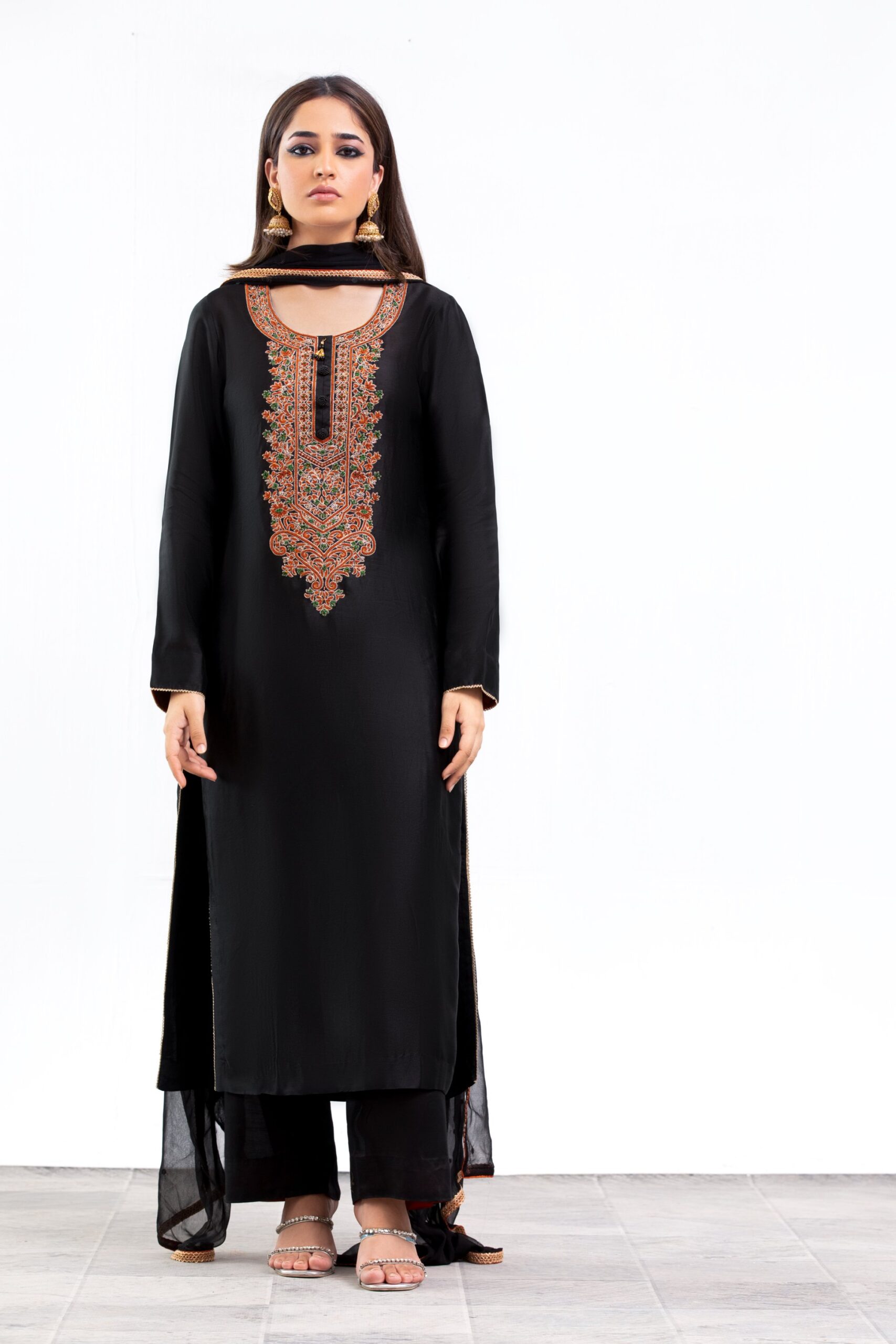 1000536280-scaled.jpg Black Ladies dress - Western Evening & Cocktail: Floor-length halter necklines, structured power shoulders, and side-slit satin or velvet slip dresses.