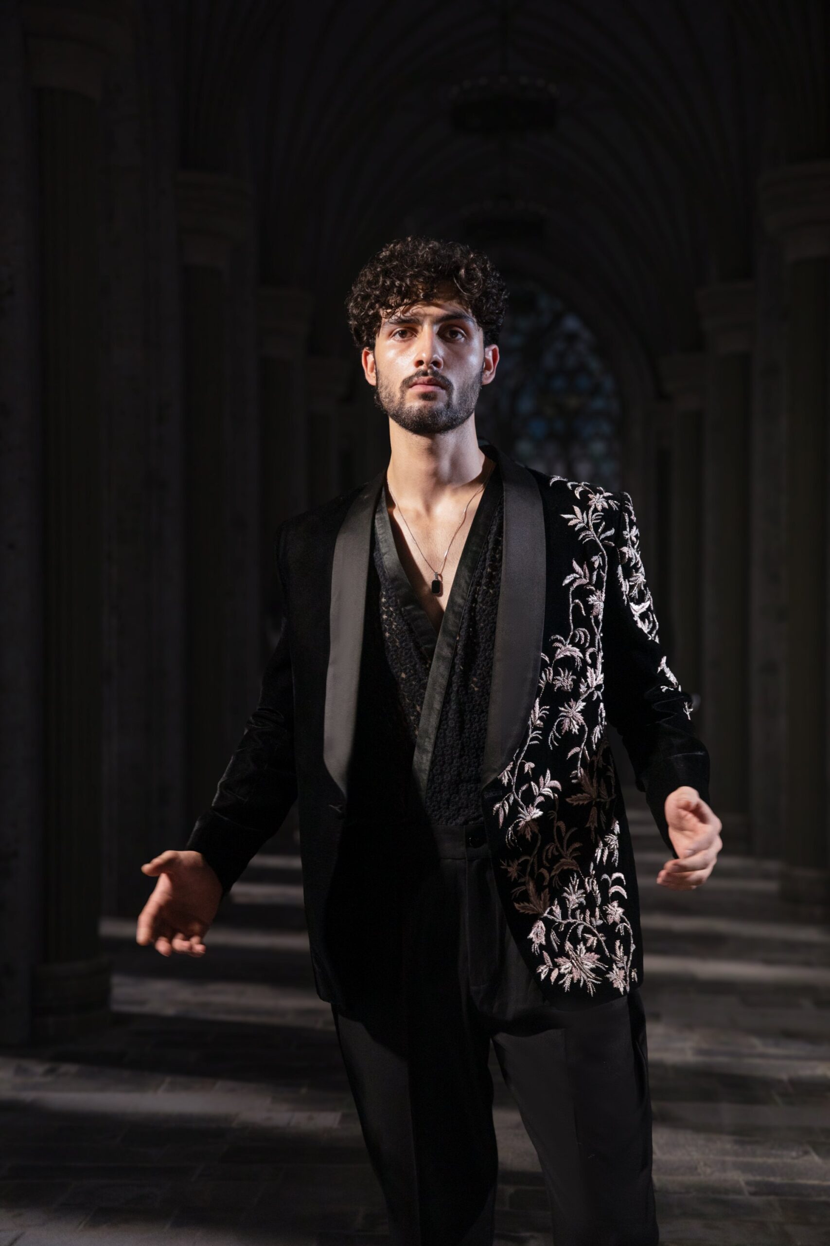 Discover Noir Regalia, an embroidered Prince Coat for men with intricate hand embroidery, satin-finish shawl lapel and tailored trousers from ÉTOILE by Nauman Arfeen.