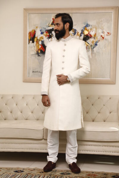 Man wearing CLASSIC WHITE mens SHERWANI for groom WITH MATCHING INNER SUIT