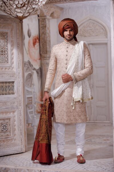man wearing White Sherwani for Groom - Mens Wedding Sherwani in Pakistan