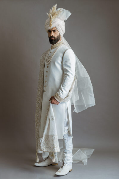 White Sherwani for Groom - Mens WeddWHITE SHERWANI PAIRED WITH MATCHING INNER SUIT, SHAWL AND TURBANing Sherwani in Pakistan