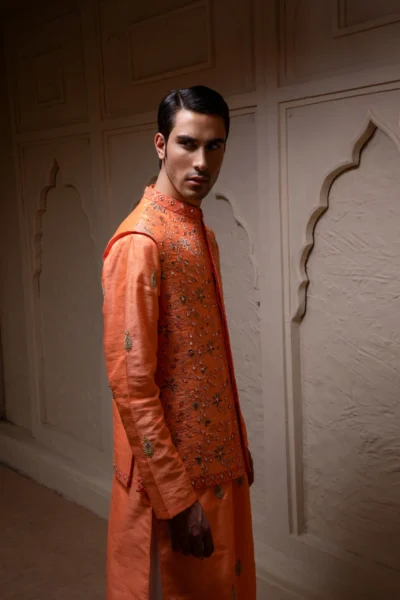orange waistcoat for men with heavy mirror work