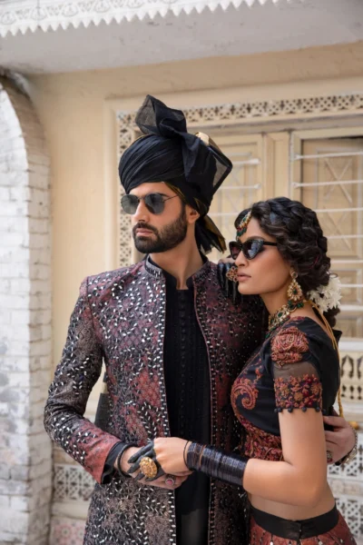 Black Sherwani Black Bridal traditional sherwani design with intricate embroidery elegant gold-embroidered sherwani for weddings royal blue silk sherwani with zardozi work ivory sherwani with floral motifs and sequins classic maroon sherwani with paisley patterns contemporary black sherwani with contrasting buttons regal ivory and gold sherwani for grooms navy blue sherwani with silver embellishments sophisticated grey sherwani with embroidered collar lavender sherwani with subtle embroidered details royal red sherwani with ornate embellishments antique gold sherwani with artistic embroidery crimson velvet sherwani with golden threadwork cream-colored sherwani with resplendent embroidery muted green sherwani with beaded accents black and gold sherwani with art deco patterns vibrant blue sherwani with silver embroidery beige sherwani with intricate gota patti work rich burgundy sherwani with threaded designs off-white sherwani with minimalist embroidery elegant sherwani design - buy online at nauman arfeen, karachi. traditional sherwani for men - nauman arfeen karachi collection. exquisite sherwani collection - shop online from nauman arfeen. karachi sherwani designs - explore nauman arfeen's online store. nauman arfeen sherwani - perfect attire for special occasions. buy sherwani online in karachi - nauman arfeen's latest collection. nauman arfeen sherwani designs - blend of modern and traditional. stylish men's sherwani - shop online at nauman arfeen, karachi. wedding sherwani collection - nauman arfeen karachi store. nauman arfeen sherwani - elevate your style for events.