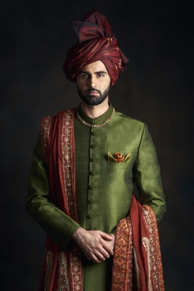 man wearing Kale Green sherwani sherwani for men, sherwani for groom, sherwani for men wedding, sherwani for wedding,