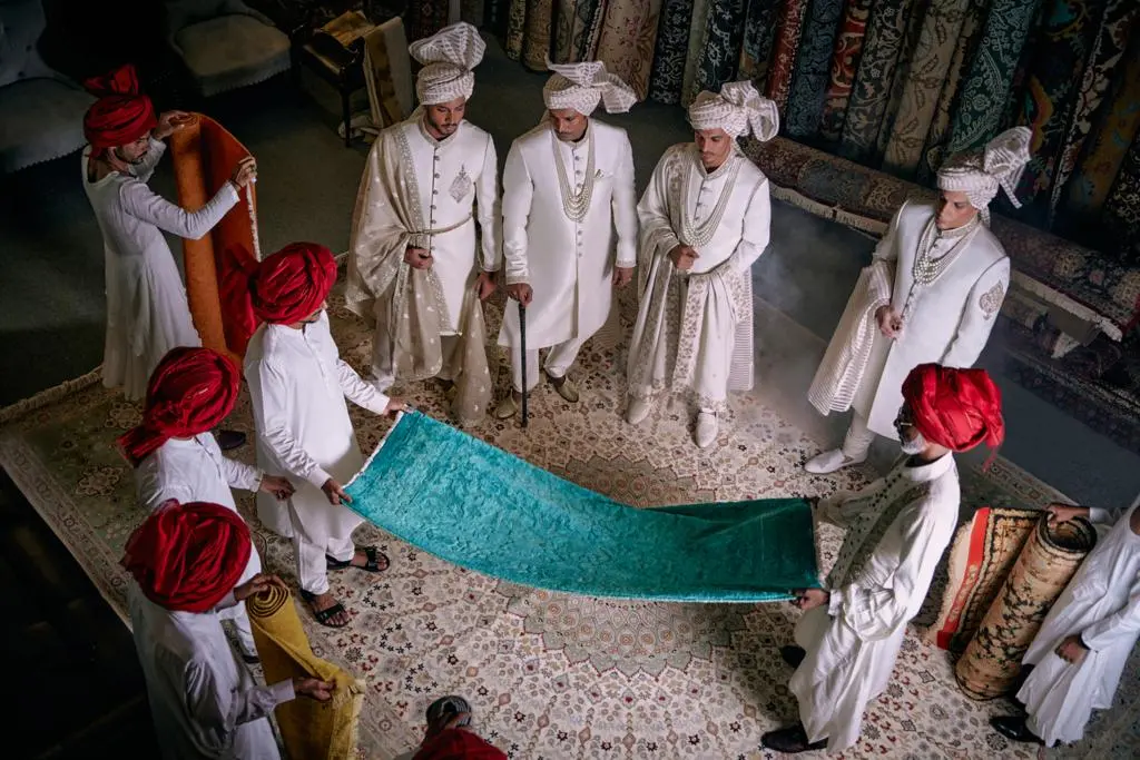 white sherwani for groom of best sherwani designer in Pakistan