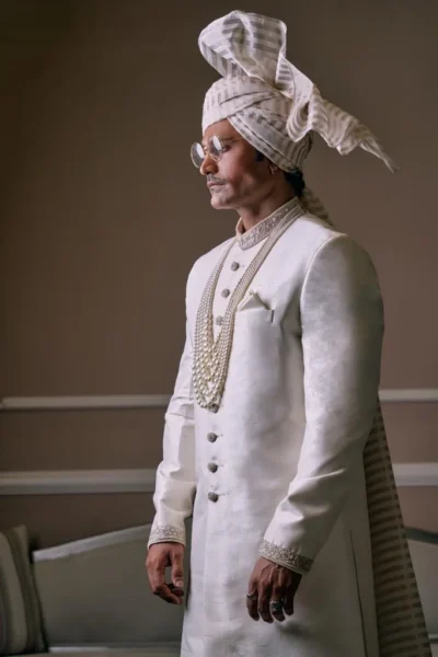 White Sherwani for groom with matching turban and matching sherwani inner suit