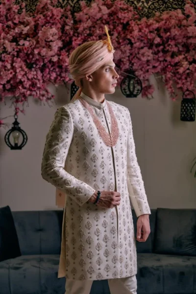 Off-White Sherwani for groom with matching turban and matching sherwani inner suit