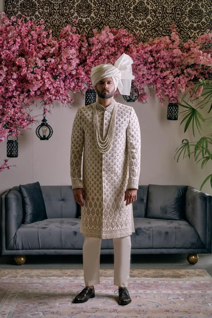 Ice Mist Off White Sherwani for groom with matching turban and inner suit