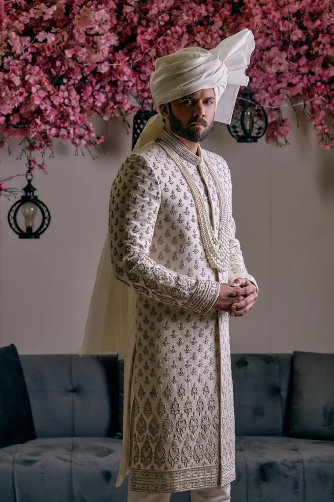 Ice Mist Off White Sherwani for groom with matching turban and inner suit
