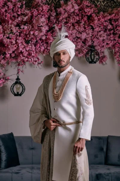 White Sherwani for groom with matching turban and matching sherwani inner suit