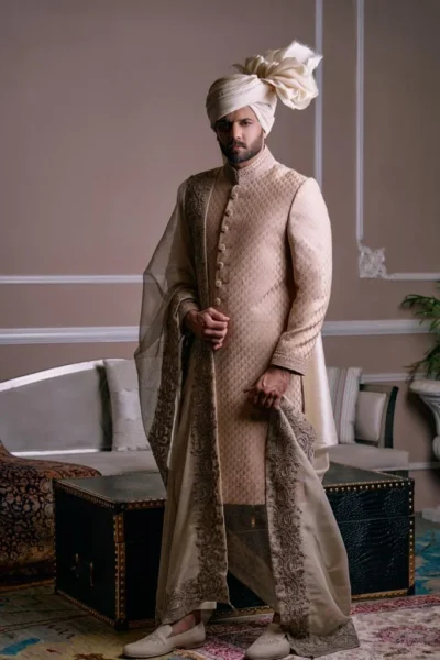 Light Fawn Sherwani for groom with matching turban wedding sherwani for groom, sherwani style, black sherwani, best fashion designer sherwani for groom in Pakistan - Shaan-e-Afghan Royal Sherwani Collection
