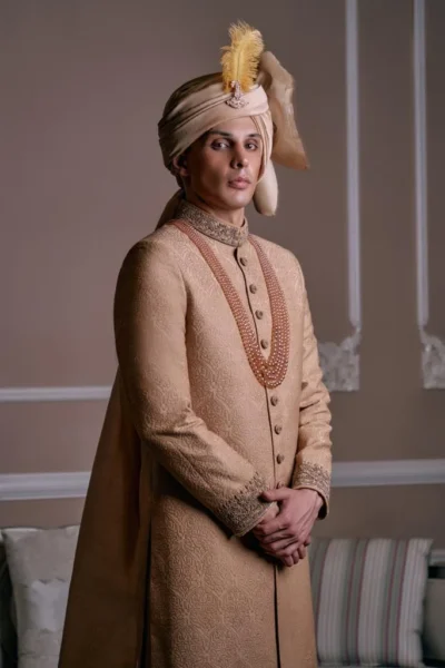 man wearing Golden Sherwani for Groom, Sherwani Set, Buy sherwani online by the best fashion designer in Pakistan