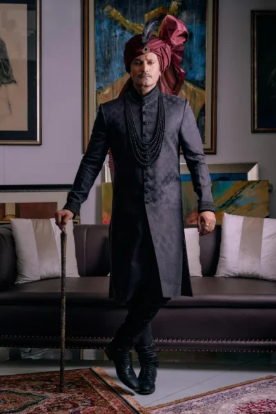 groom wearing FROST BLACK SHERWANI WITH MATCHING INNER SUIT PAIRED WITH MAROON TURBAN - buy black sherwani - designer black sherwani - sherwani set