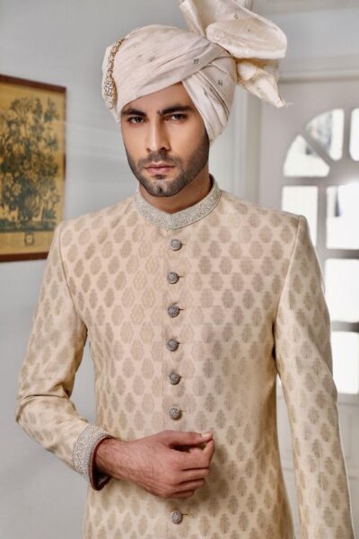 man wearing CHAMPAGNE GOLD SHERWANI for groom PAIRED WITH MATCHING INNER SUIT AND TURBAN on wedding day Buy Sherwani for Groom