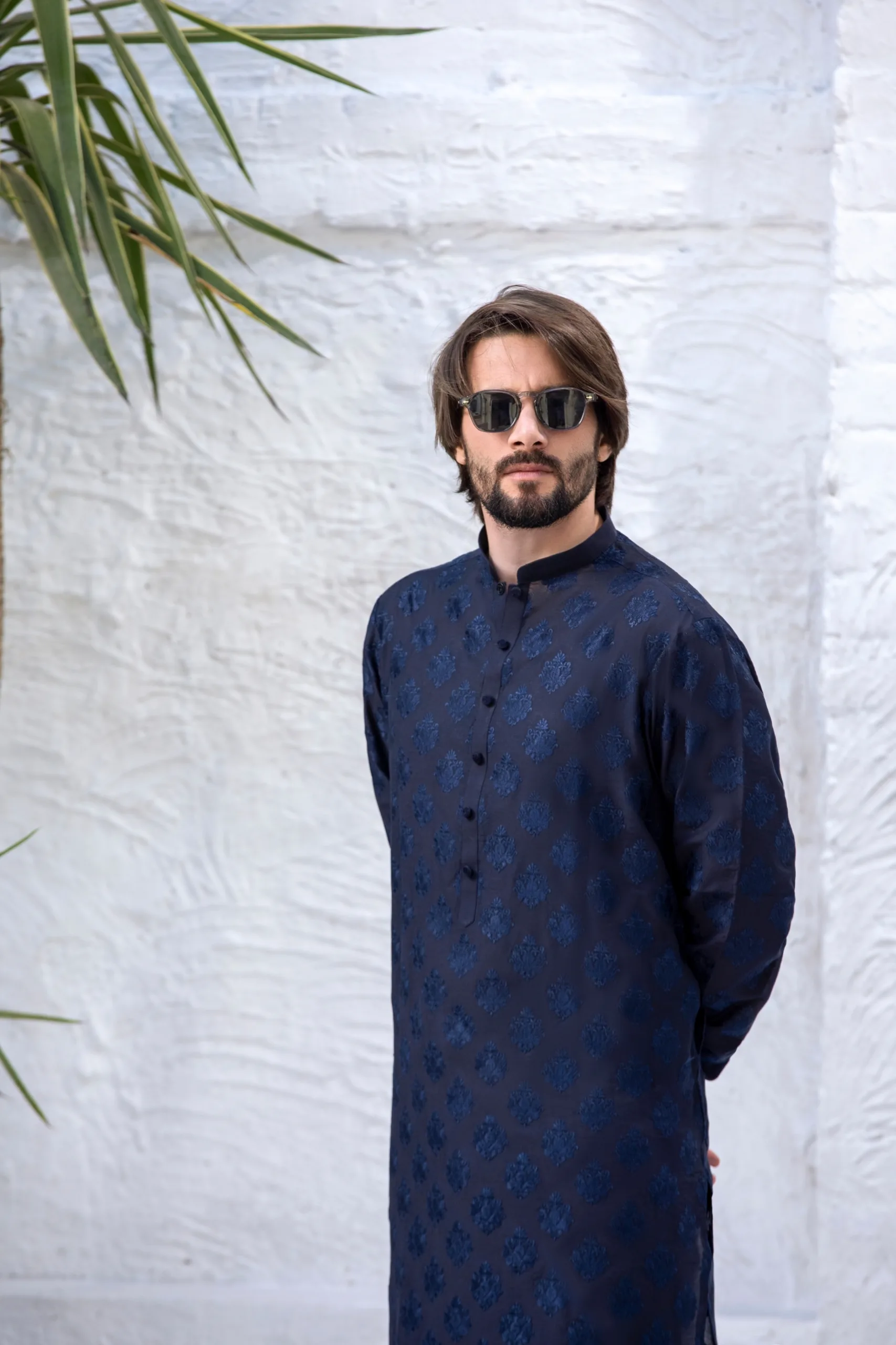 Denim blue kurta with tonal motifs paired with white pajamas