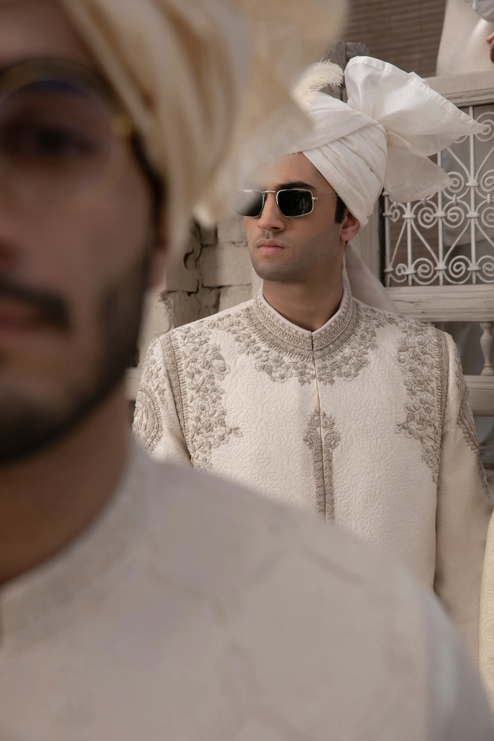 Sherwani for Groom IVORY MAJESTY ROYAL SHERWANI IN EXQUISITE KORA WORK WITH REGAL EMBELLISHMENTS Group of men in designer Sherwani in karachi Pakistan of the best Mens wear designer in Pakistan best sherwani designer Naushemian by Nauman arfeen - Buy white sherwani for men