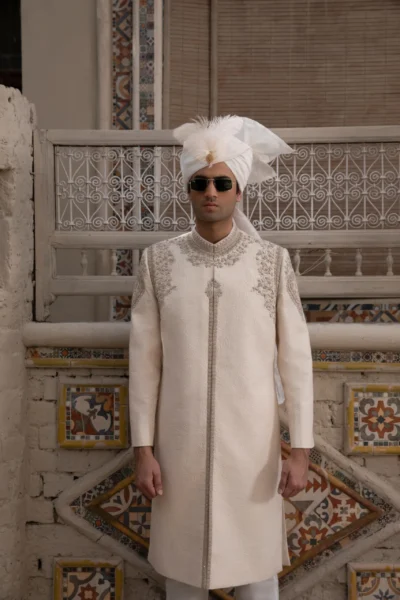 IVORY MAJESTY ROYAL SHERWANI IN EXQUISITE KORA WORK WITH REGAL EMBELLISHMENTS