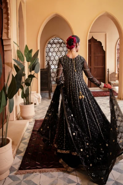 Enchanting Enigmatic layered black couture frock in net and luxurious fabric.