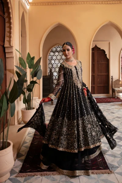 Enchanting Enigmatic layered black couture frock in net and luxurious fabric.