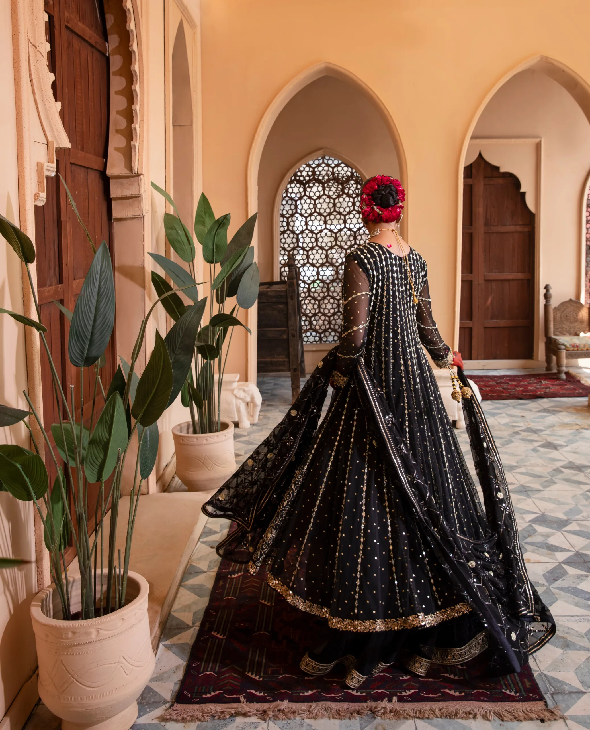 Enchanting Enigmatic layered black couture frock in net and luxurious fabric. Enchanting Enigmatic layered black couture frock in net and luxurious fabric.