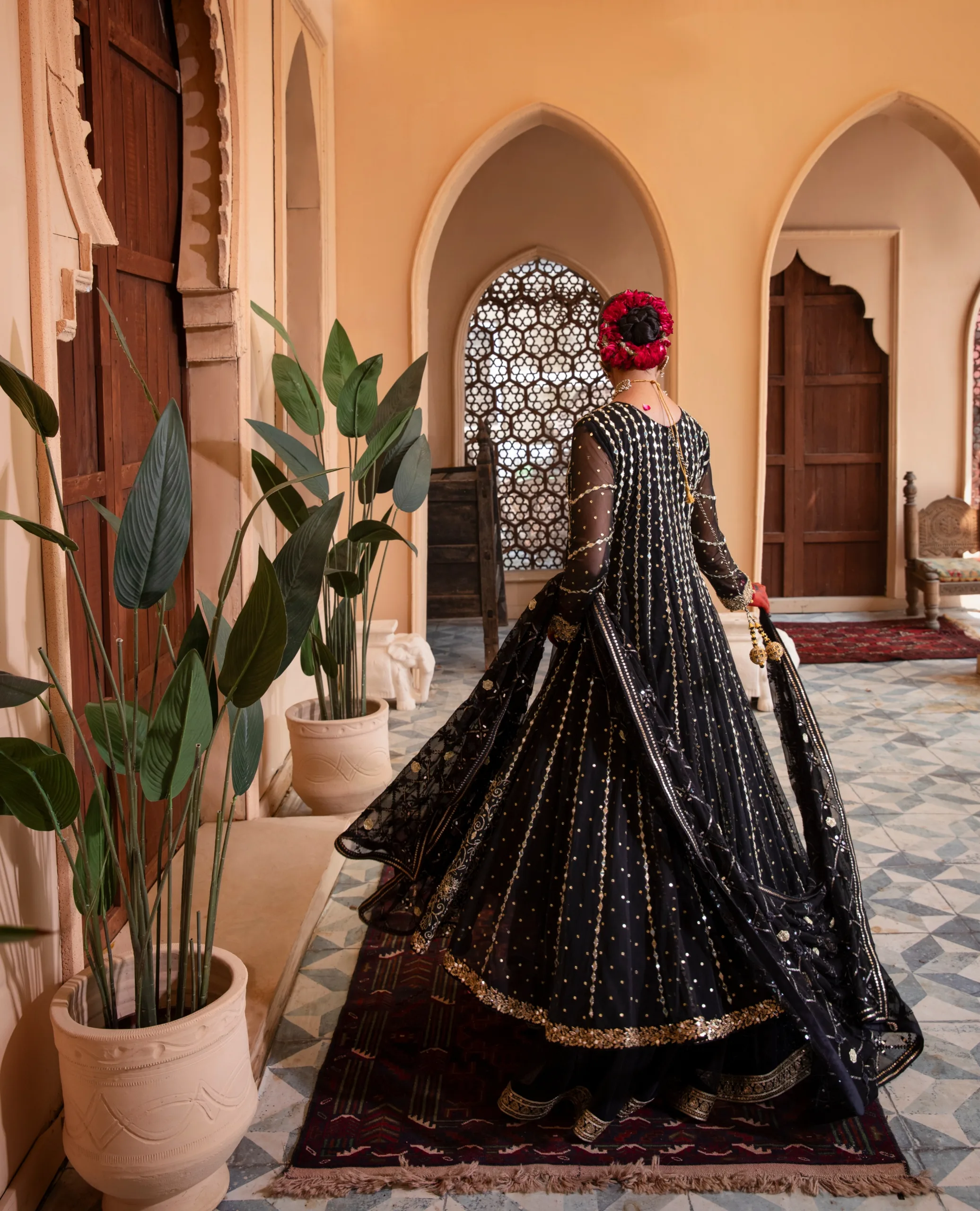 Enchanting Enigmatic layered black couture frock in net and luxurious fabric. Enchanting Enigmatic layered black couture frock in net and luxurious fabric.