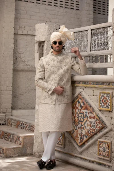 Luxurious ivory white prince coat for men with delicate embroidery and striking back motif