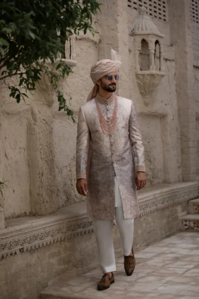 Elegant pearl white jacquard sherwani with intricate collar embroidery, made from luxurious jacquard fabric