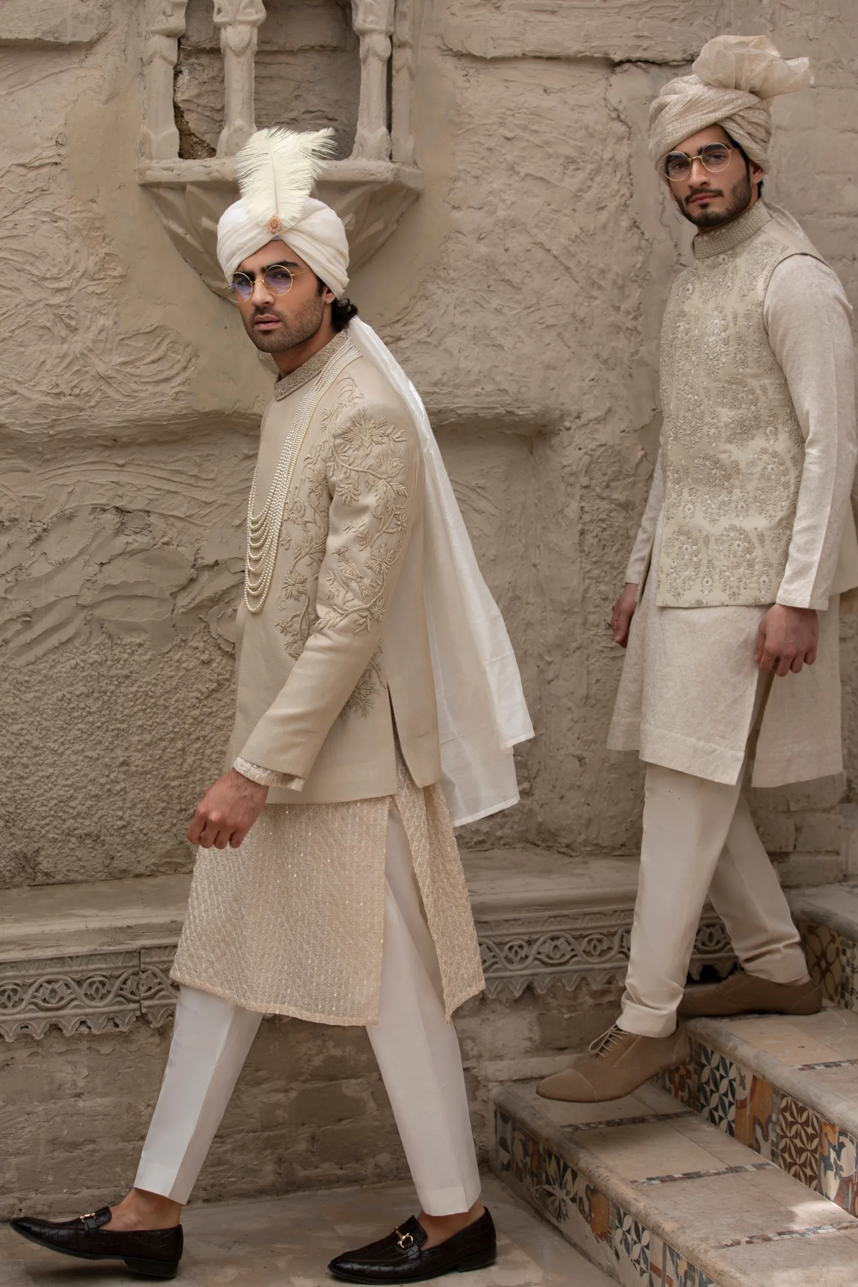 Stunning beige prince coat with intricate half embroidery on the front and full collar embroidery. Stunning beige prince coat with intricate half embroidery on the front and full collar embroidery.