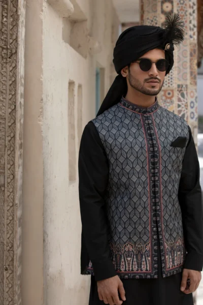 Mens Festive Waistcoat by Naushemian by Nauman Arfeen Stunning bluish-black color with intricate crystal glass embroidery at borders