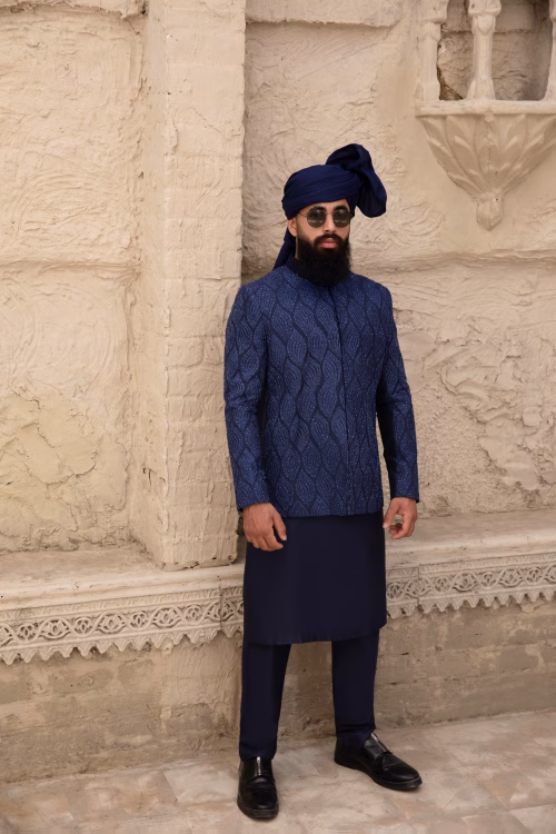 Exquisite hand-embroidered prince coat with grand back design