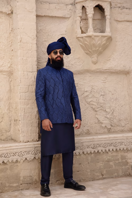 Exquisite hand-embroidered prince coat with grand back design
