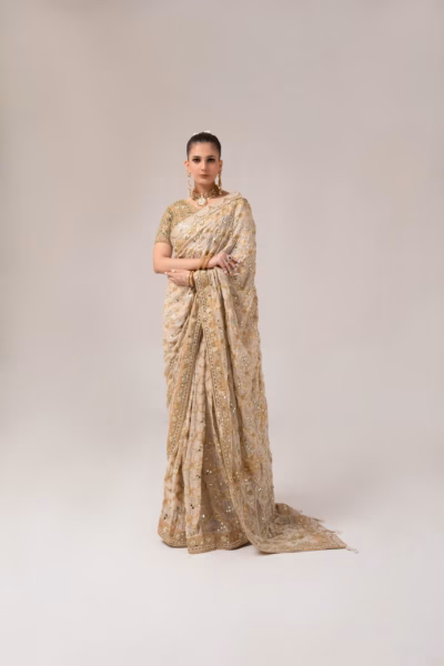 stunning beige gold ladies saree