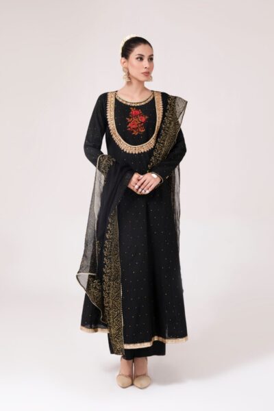 Dazzle in our stunning maroon embroidered panel frock suit in cotton fabric with glittery dots, featuring intricate round neckline with rose gold hand work, full sleeves, and embroidered borders. Paired with a long embroidered chiffon dupatta with block print on borders and raw silk trousers