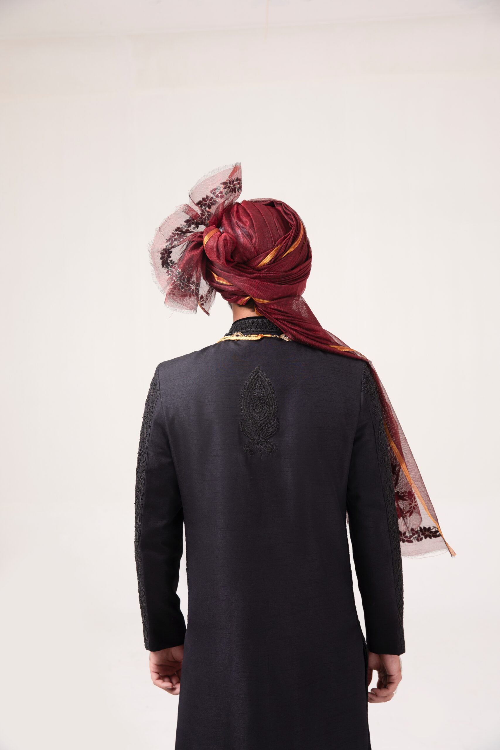 B612_20241116_234258_683 Imperial Black Sherwani for groom with Exquisite Embroidery - Black sherwani of Naushemian by Nauman Arfeen