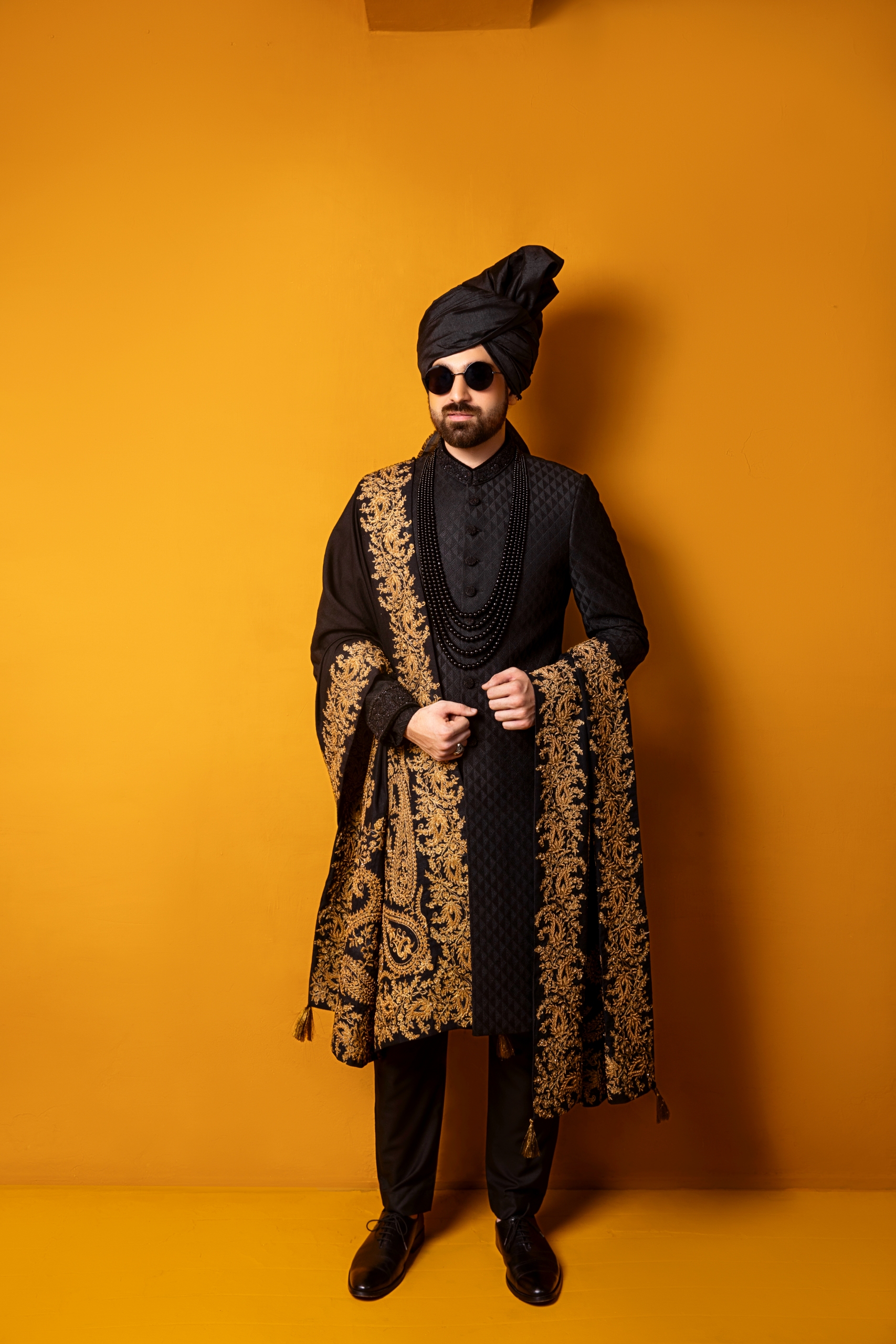 black sherwani for men - black and gold sherwani for groom