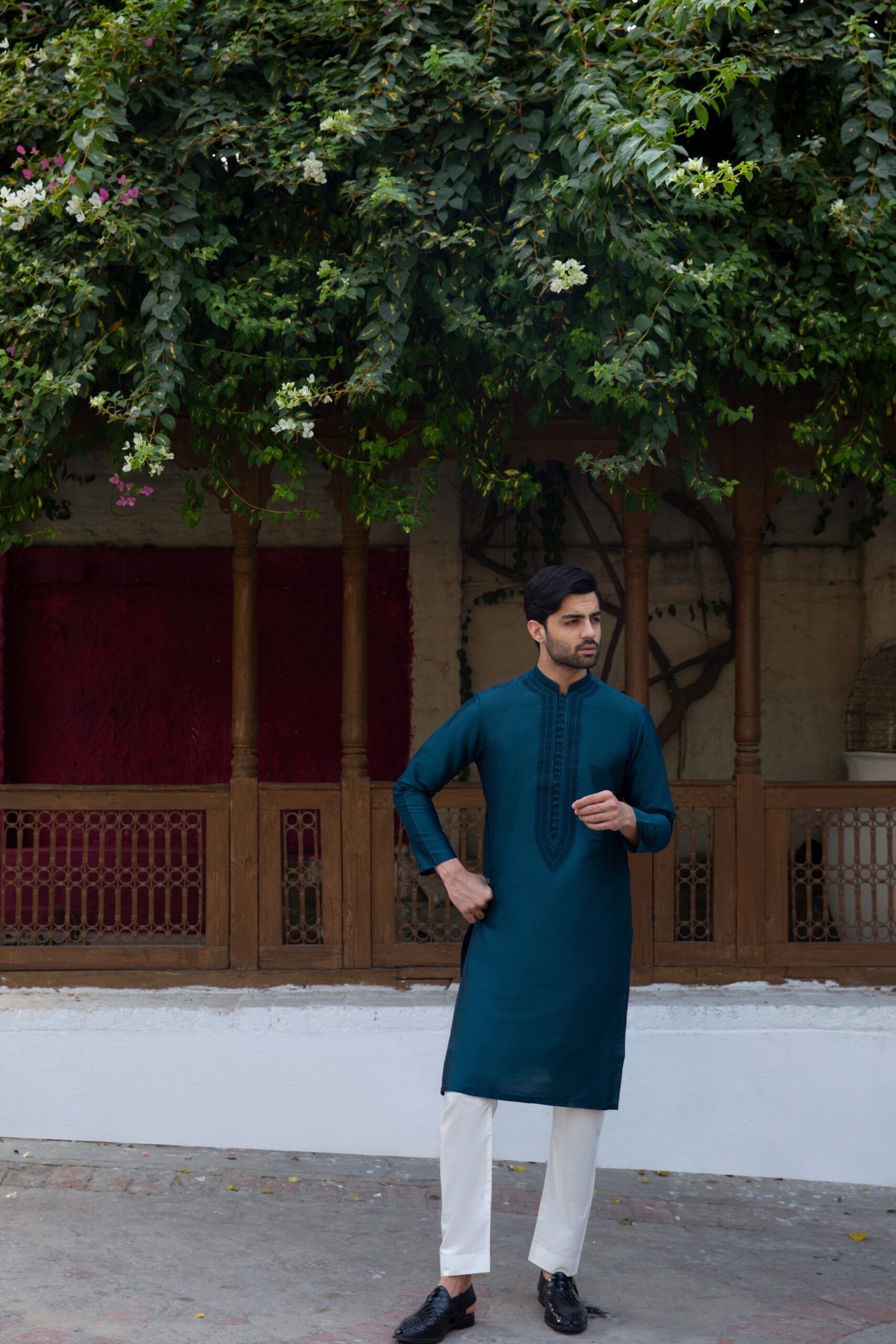 B612_20250312_203408_023 stunning men's blue kurta with front embroidery