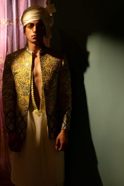 Mehendi Prince Coat with heavily embroidered mirror work and intricate mehendi designs