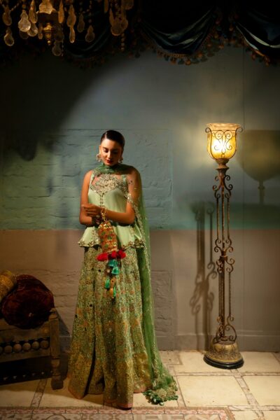 Green Bridal Dress with Intricate Embroidery & Mirror Work
