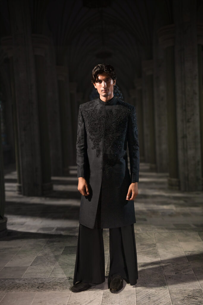 Naushemian jet black sherwani with tonal embroidery and beadwork, tailored trousers, and regal silhouette