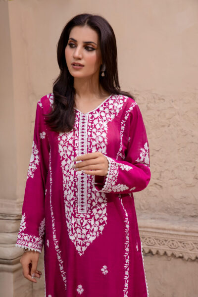 stunning magenta pink embroidered kurti and trouser set featuring intricate white thread embroidery