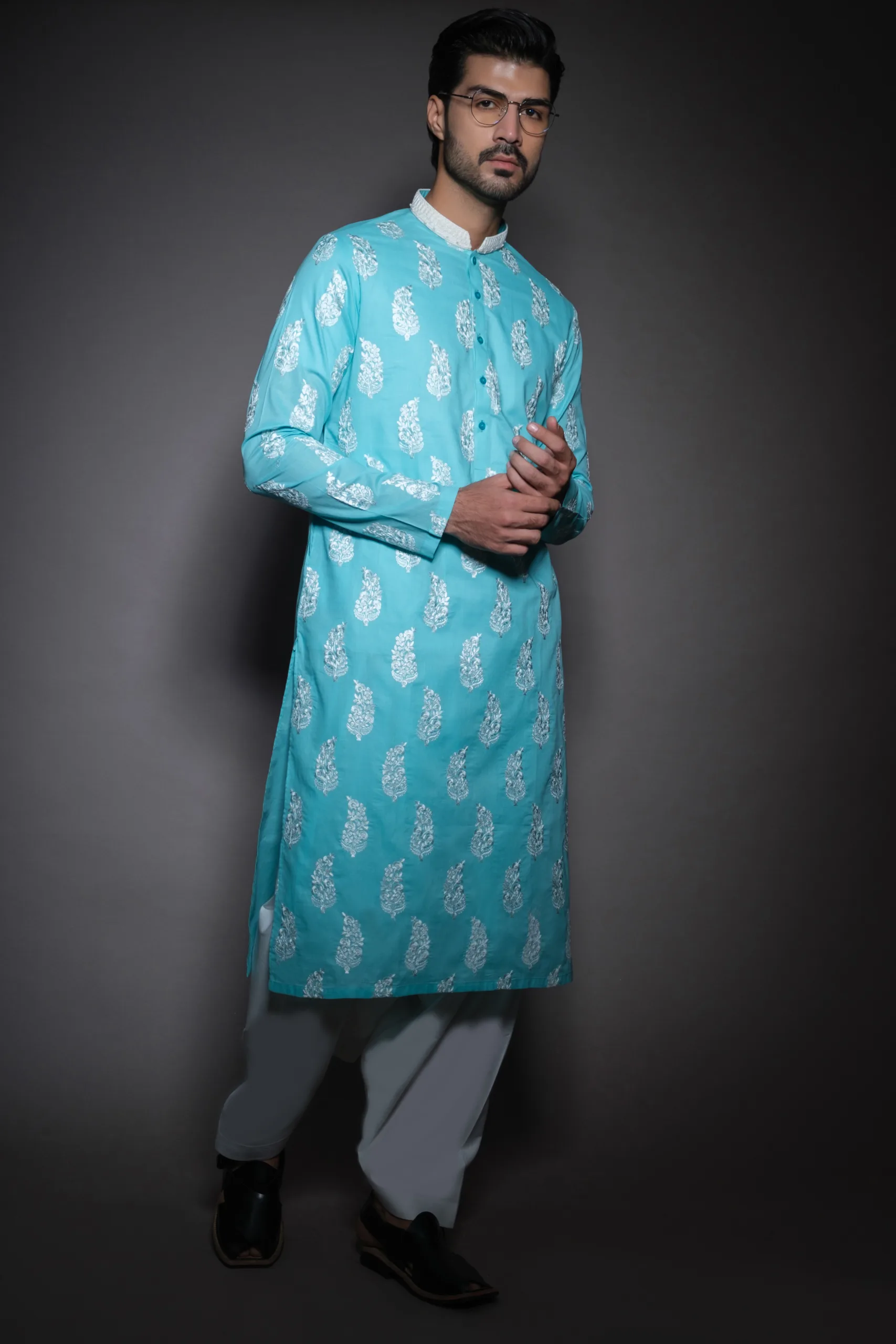 white-embroidered arctic blue kurta of Naushemian by Nauman Arfeen white-embroidered arctic blue kurta of Naushemian by Nauman Arfeen