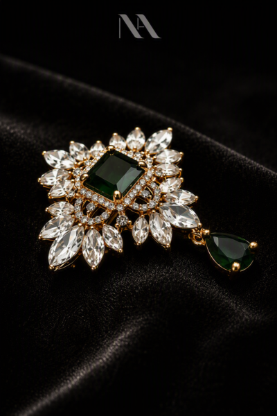 Gold statement brooch with Emerald-cut green crystal and marquise diamond-cut stones. Perfect Sherwani or lapel pin