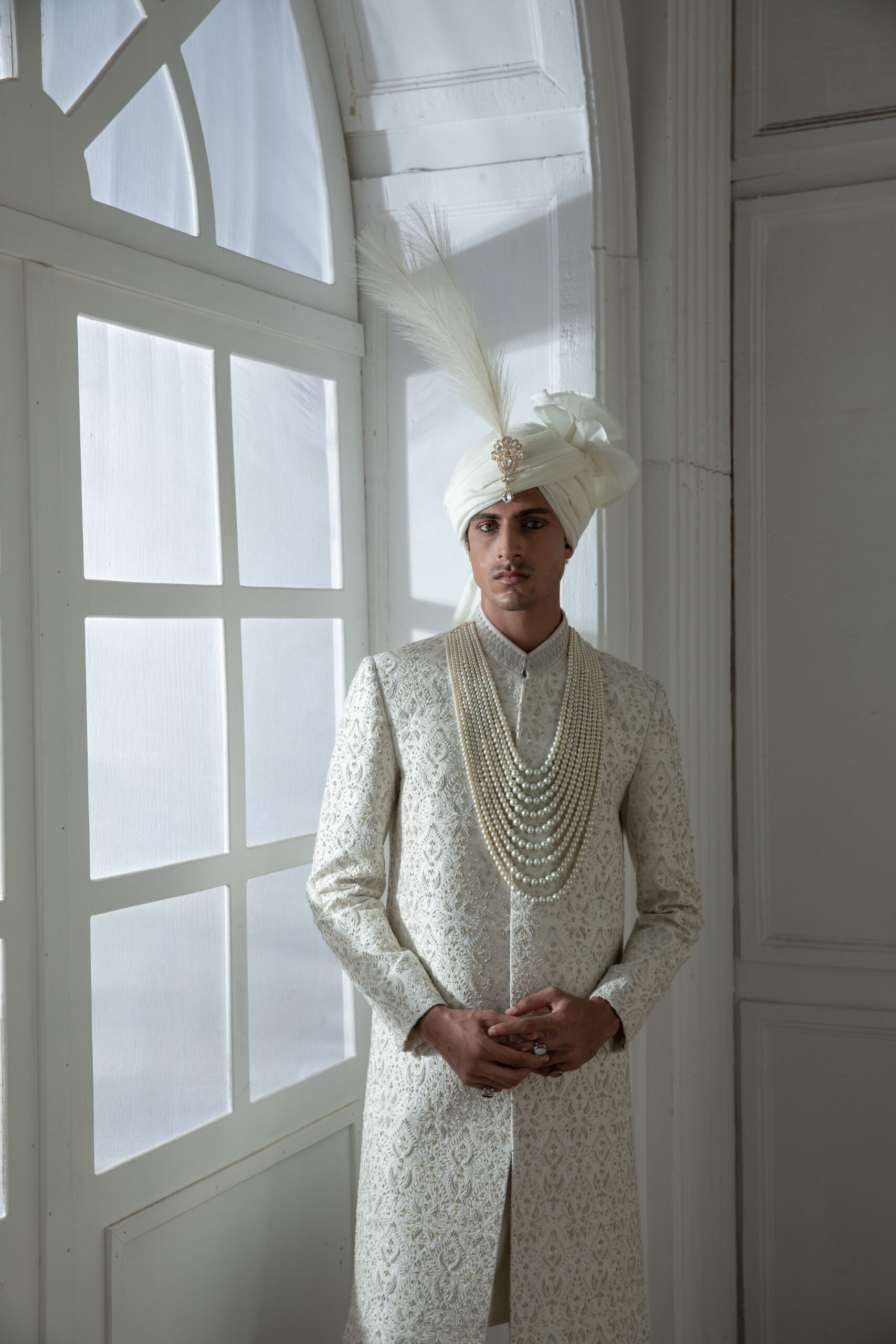 _F1A2112 Pakistani groom wedding sherwani by Naushemian Nauman Arfeen โ Divinus masterpiece design featuring intricate Kora embroidery, filigree detailing, embroidered shawl, regal turban, and handcrafted Khoosa shoes for luxury weddings