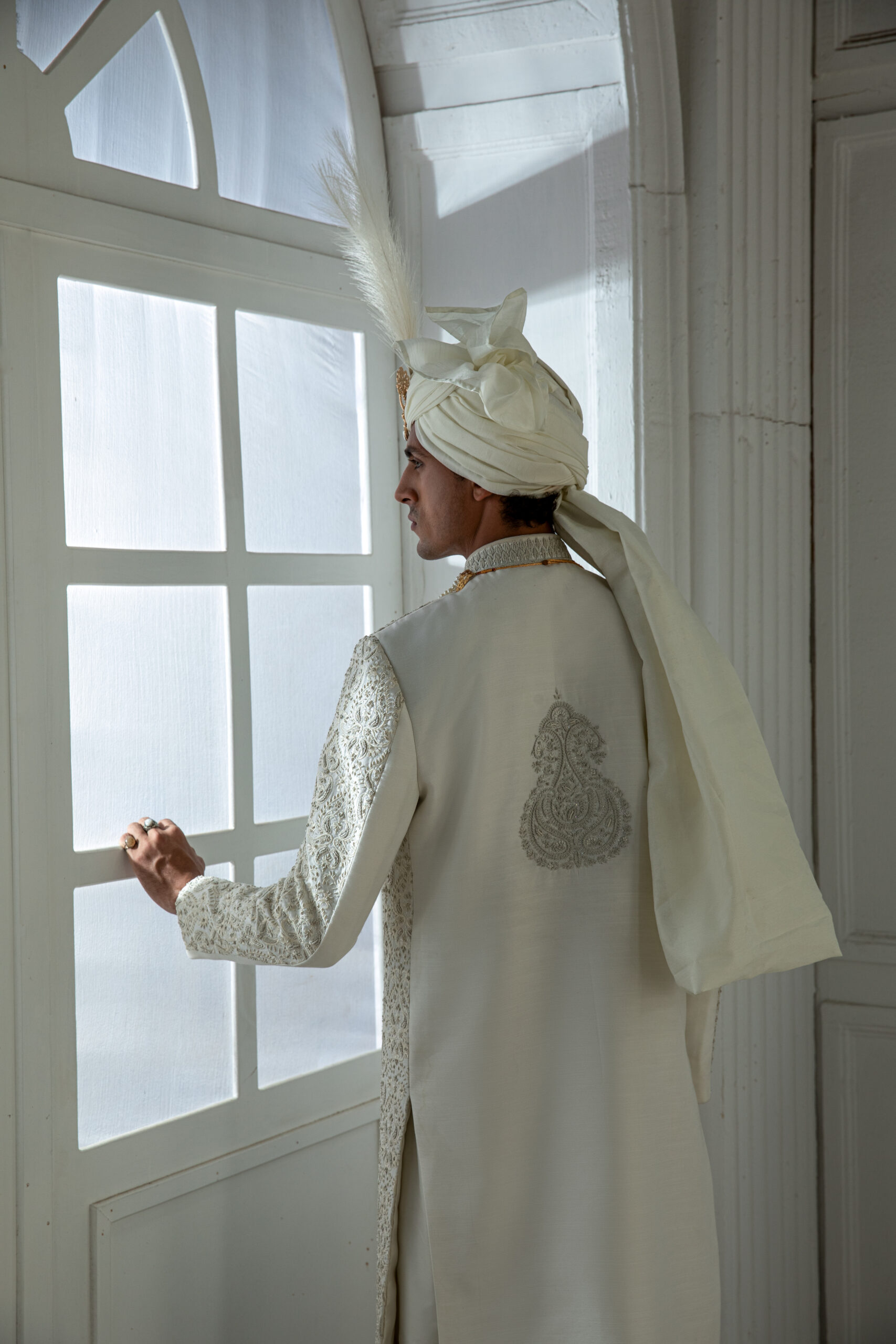 _F1A2115 Pakistani groom wedding sherwani by Naushemian Nauman Arfeen โ Divinus masterpiece design featuring intricate Kora embroidery, filigree detailing, embroidered shawl, regal turban, and handcrafted Khoosa shoes for luxury weddings
